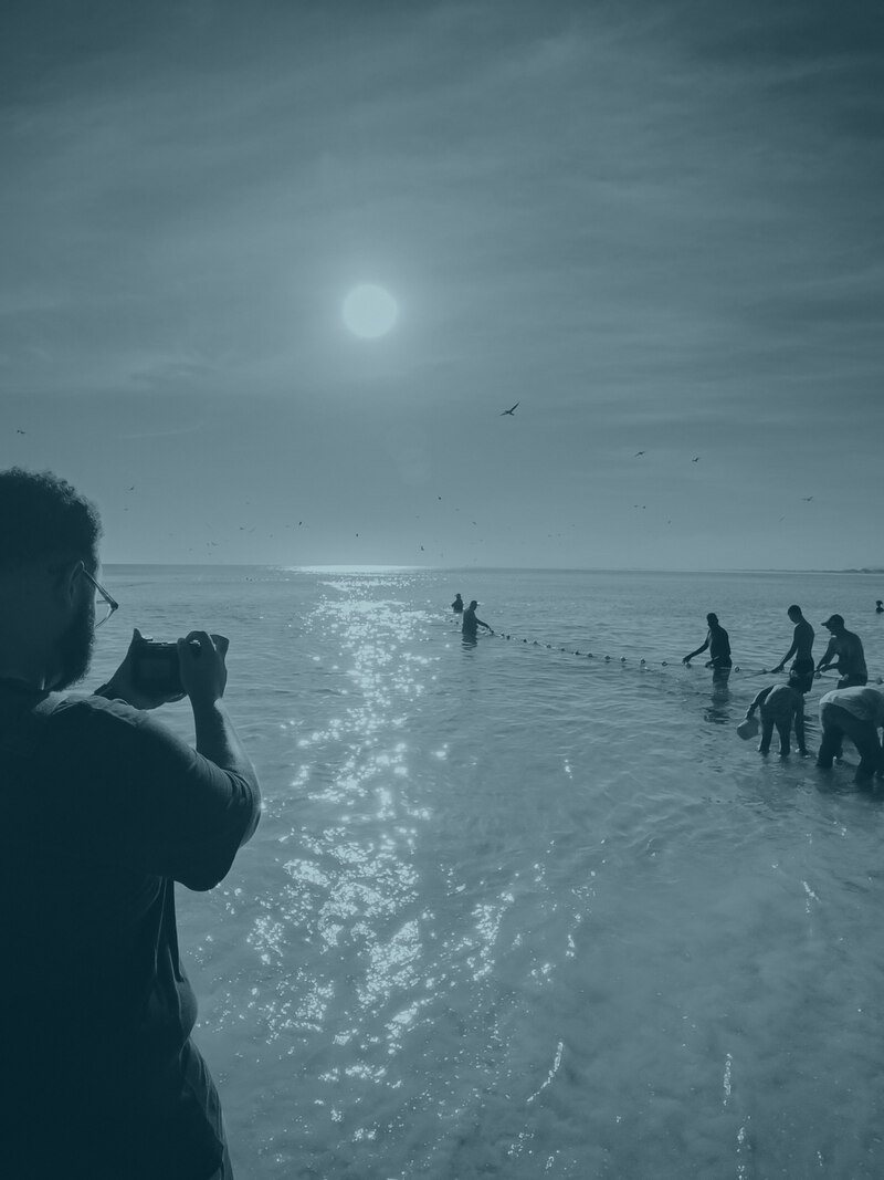 Filming the net being pulled in at dawn, Arraial do Cabo